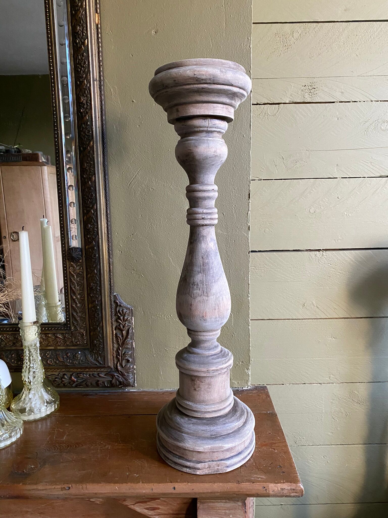 Old wooden church candle holder