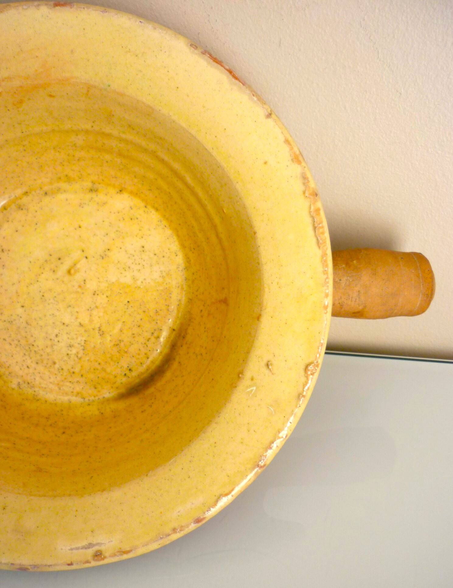 Frying pan, old caquelon, yellow glazed earthenware from the south of France.