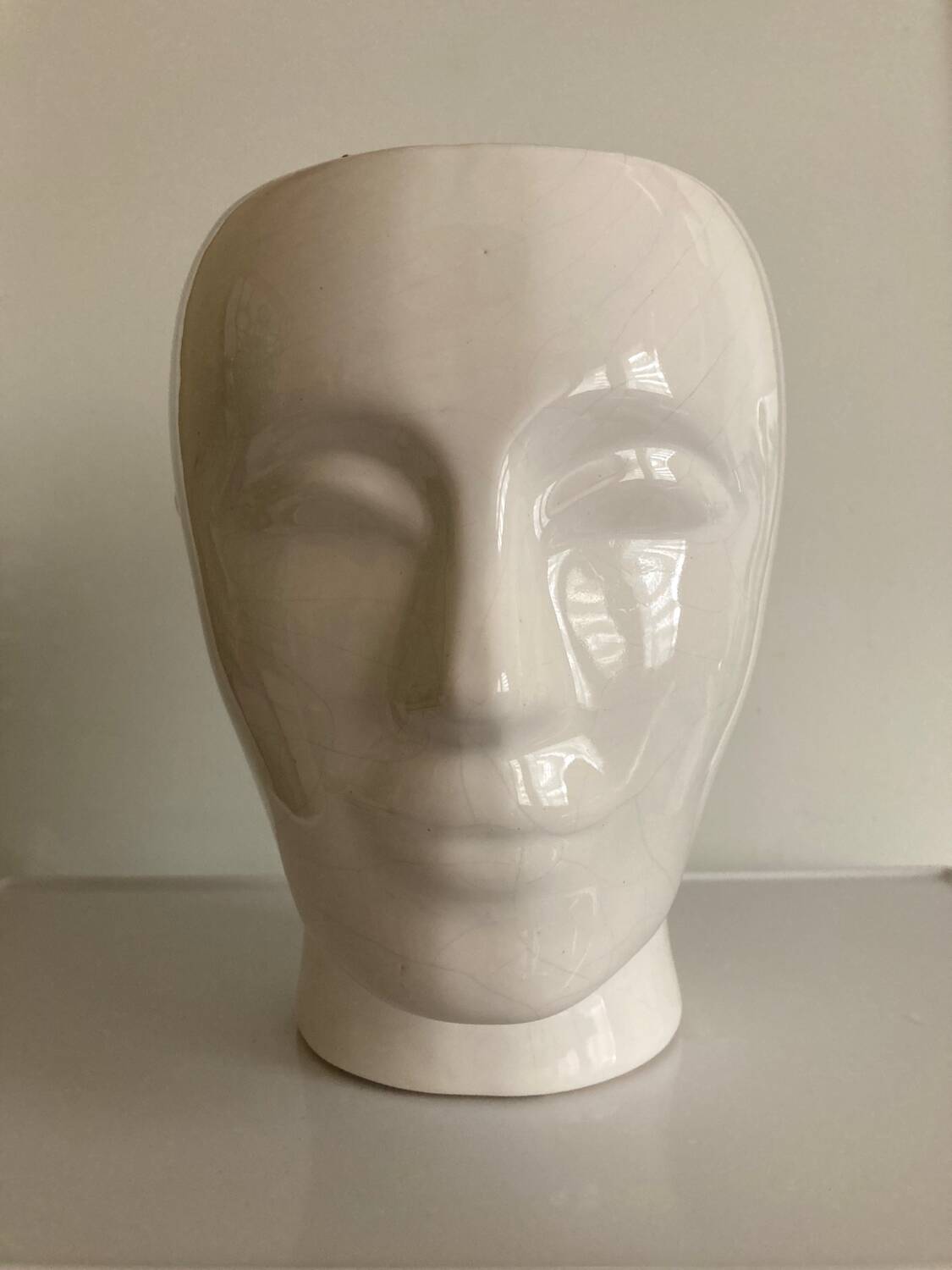 Vintage white ceramic face-shaped vase or planter