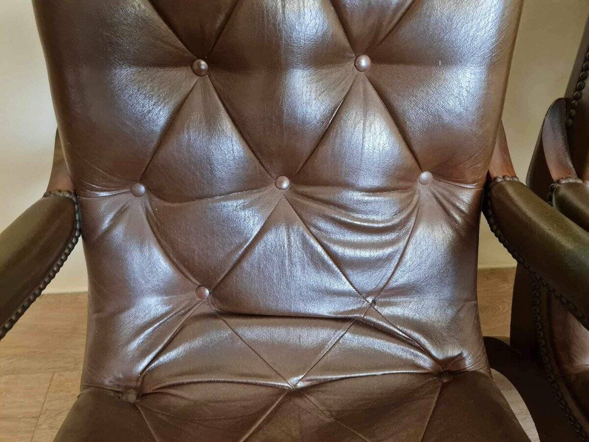 Pair of leather chesterfiel armchairs