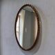 Robust vintage oval wall mirror in wood