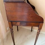 Pretty little secretary with a curtain.