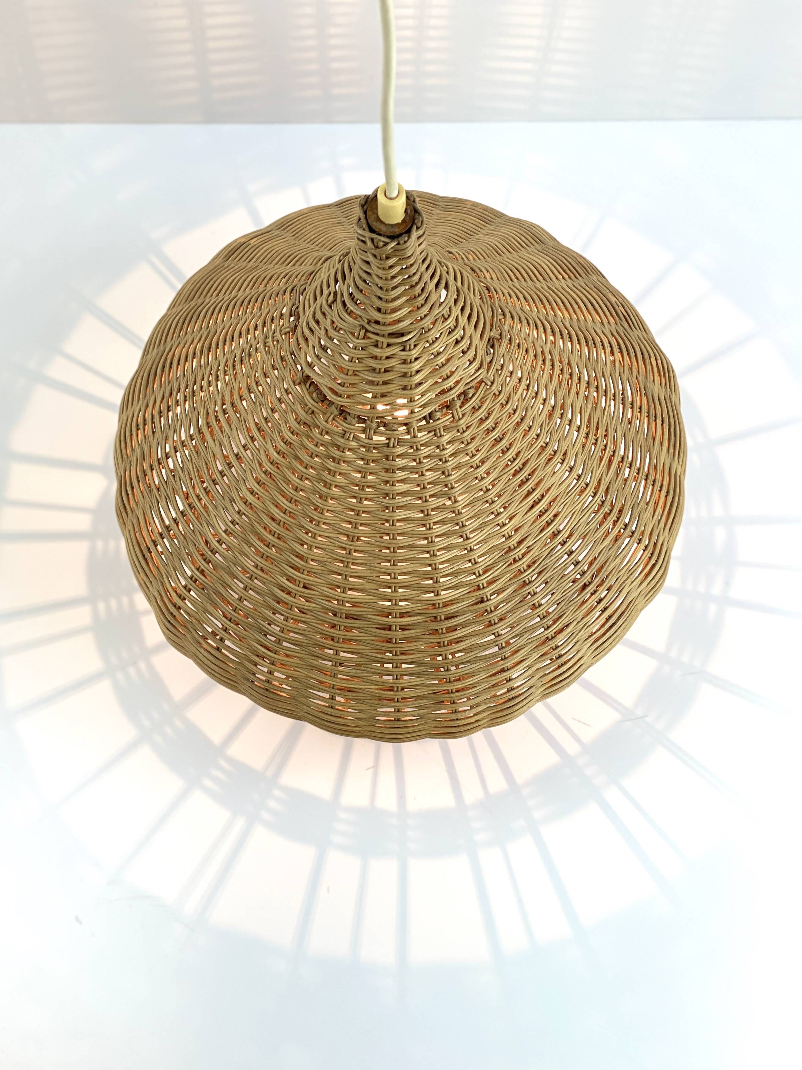 Vintage wicker pendant light from the 1960s.