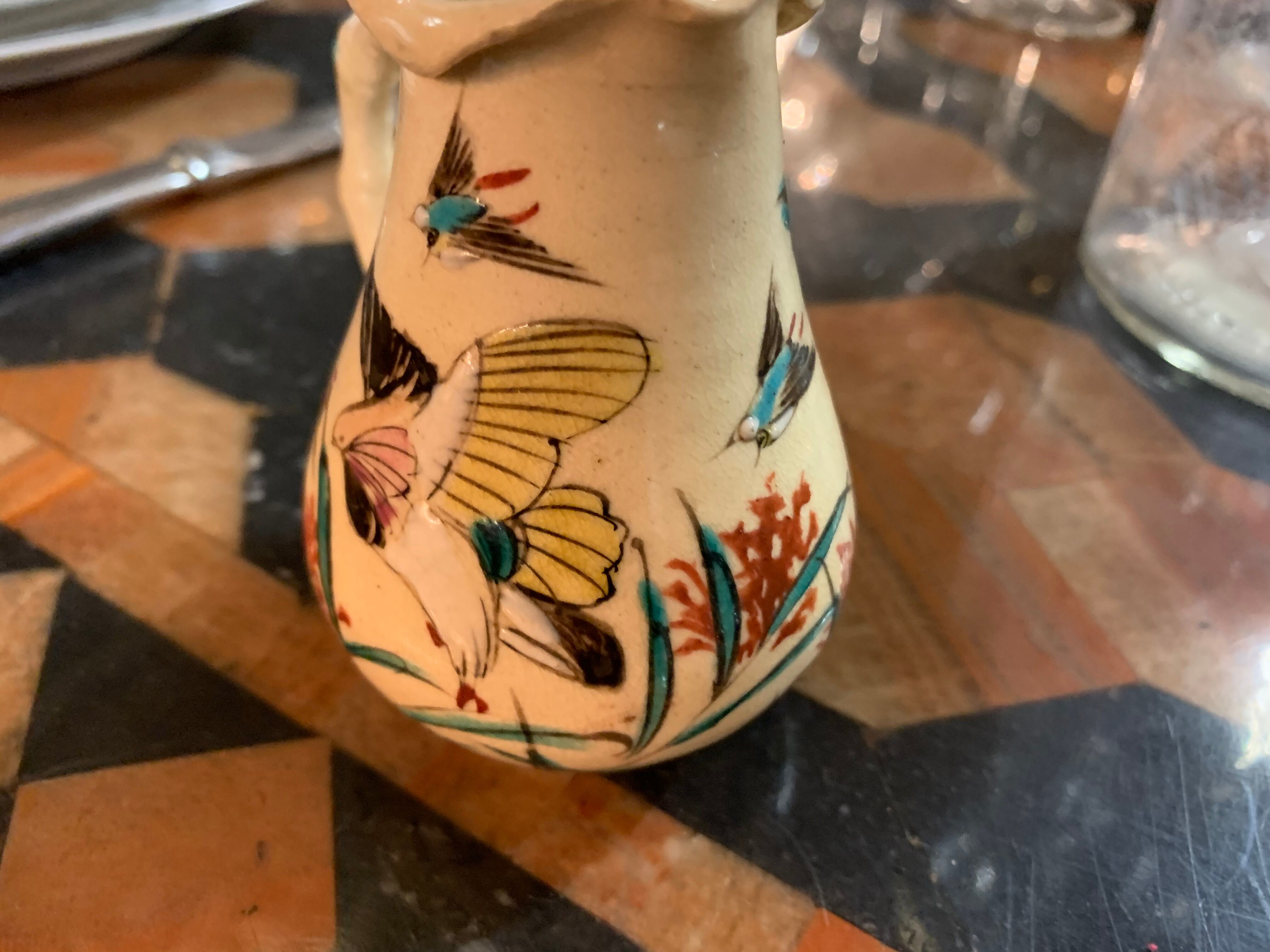 Enamelled porcelain pitcher