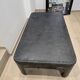 Industrial coffee table in riveted metal from around 1920 – black patina – 145 × 80 cm