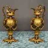 Pair of neo-Renaissance gilt bronze pitchers.