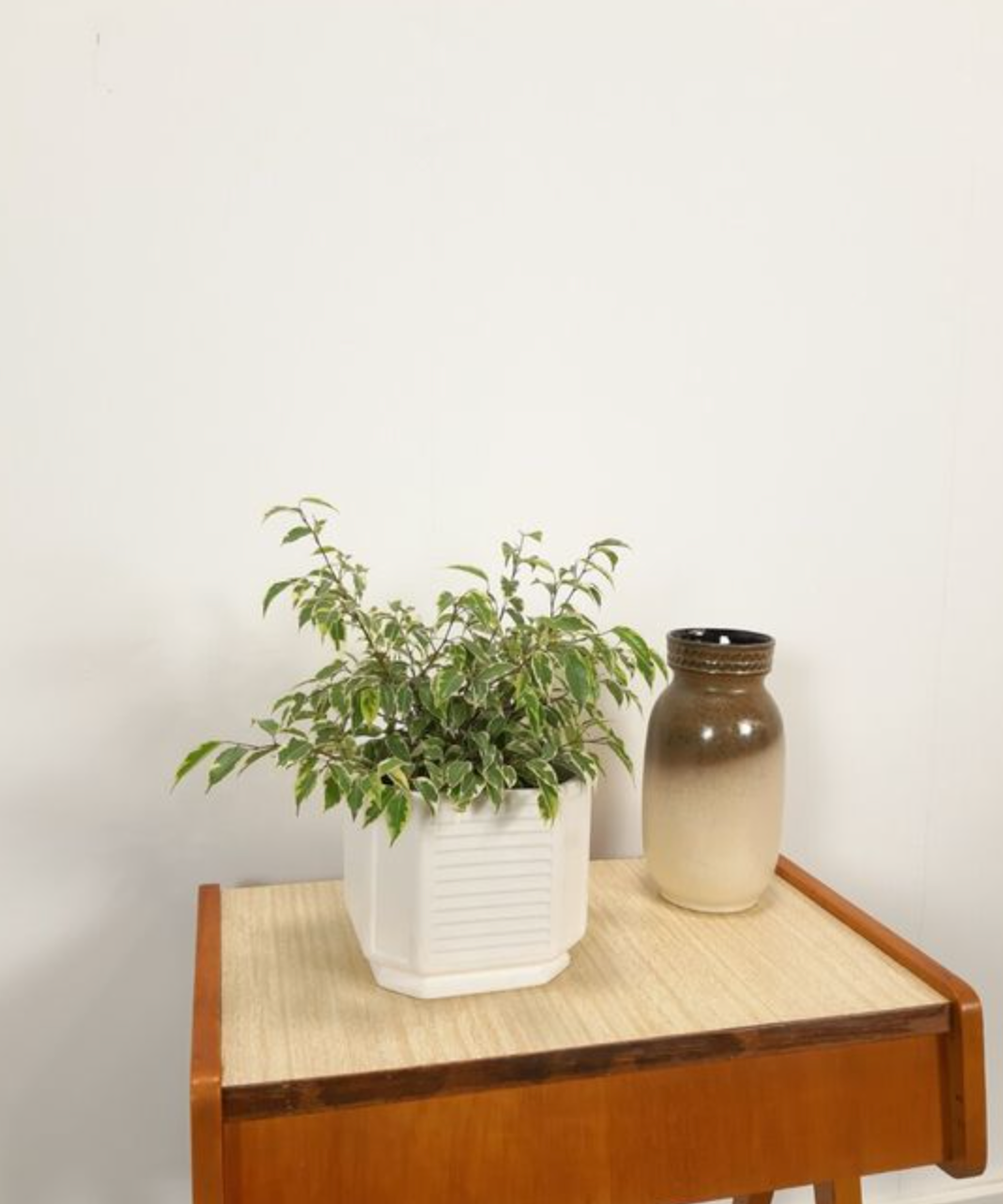 White vintage pot cover with stripes