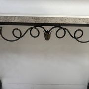 Art Deco console in hammered wrought iron, 20th century.