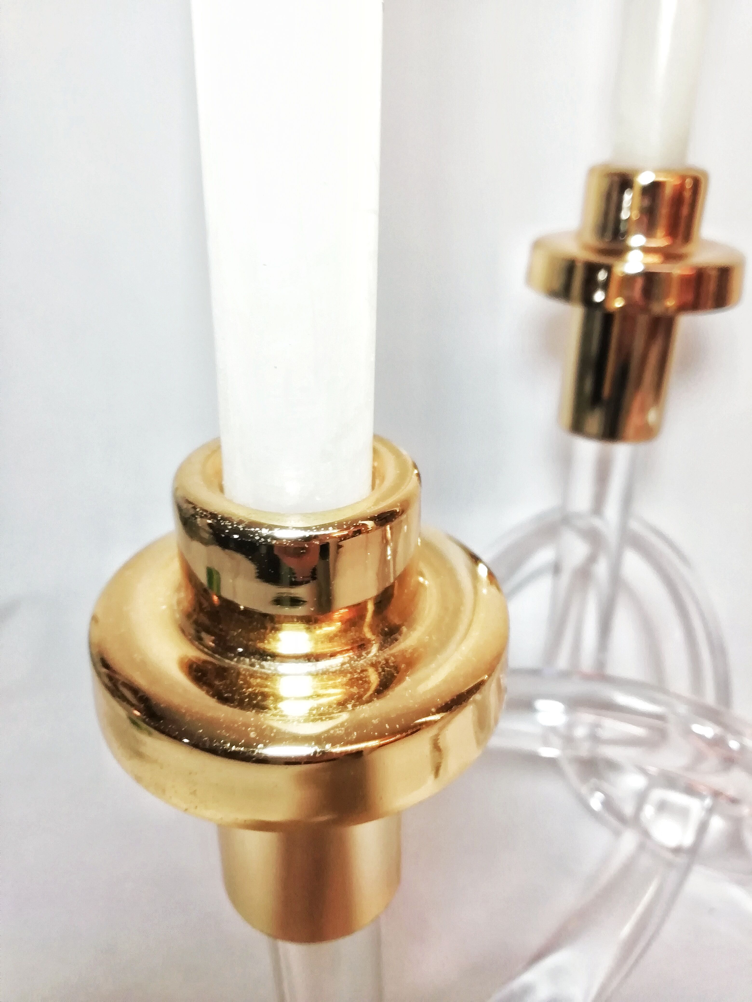 Pair of Dorothy Thorpe's pretzel chandeliers