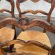 4 Louis XV chairs in solid carved oak with rush seats from the 19th century.
