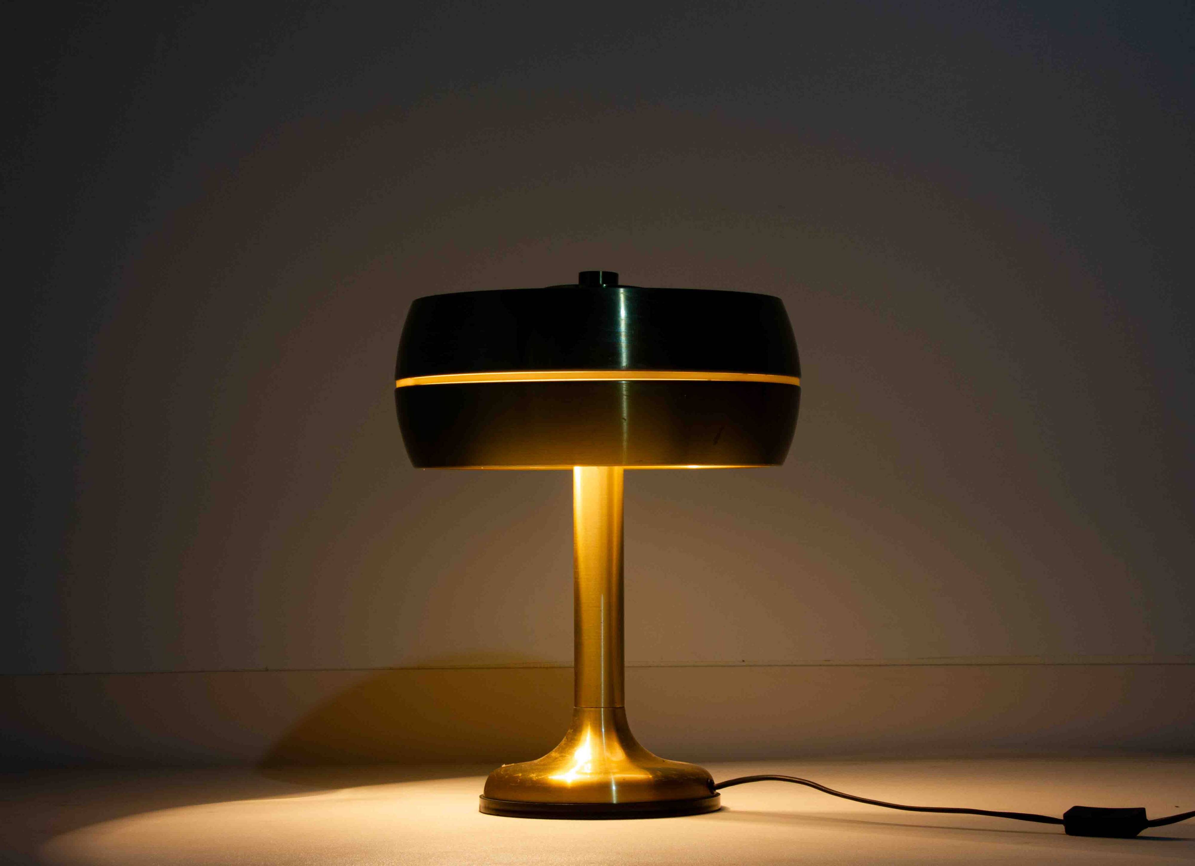 Italian brass table desk lamp with sculptural base and glowing band, 1960s