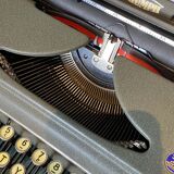 Triumph perfekt typewriter with its transport box.