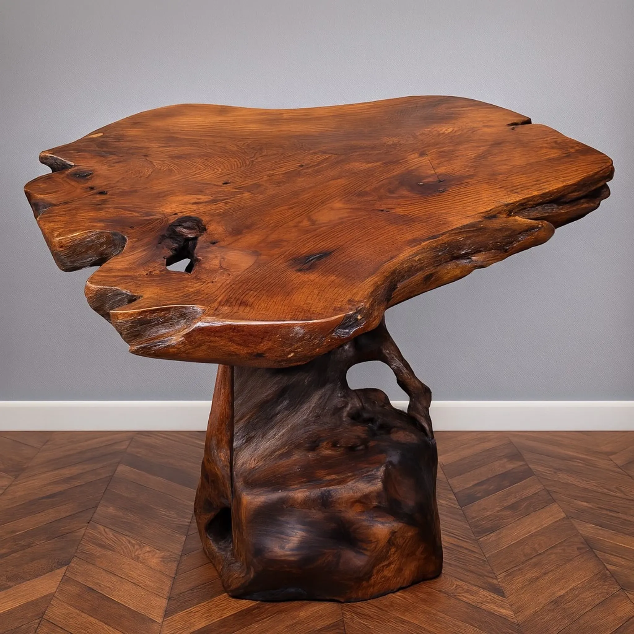 Sculpted olive wood table, made from a root.