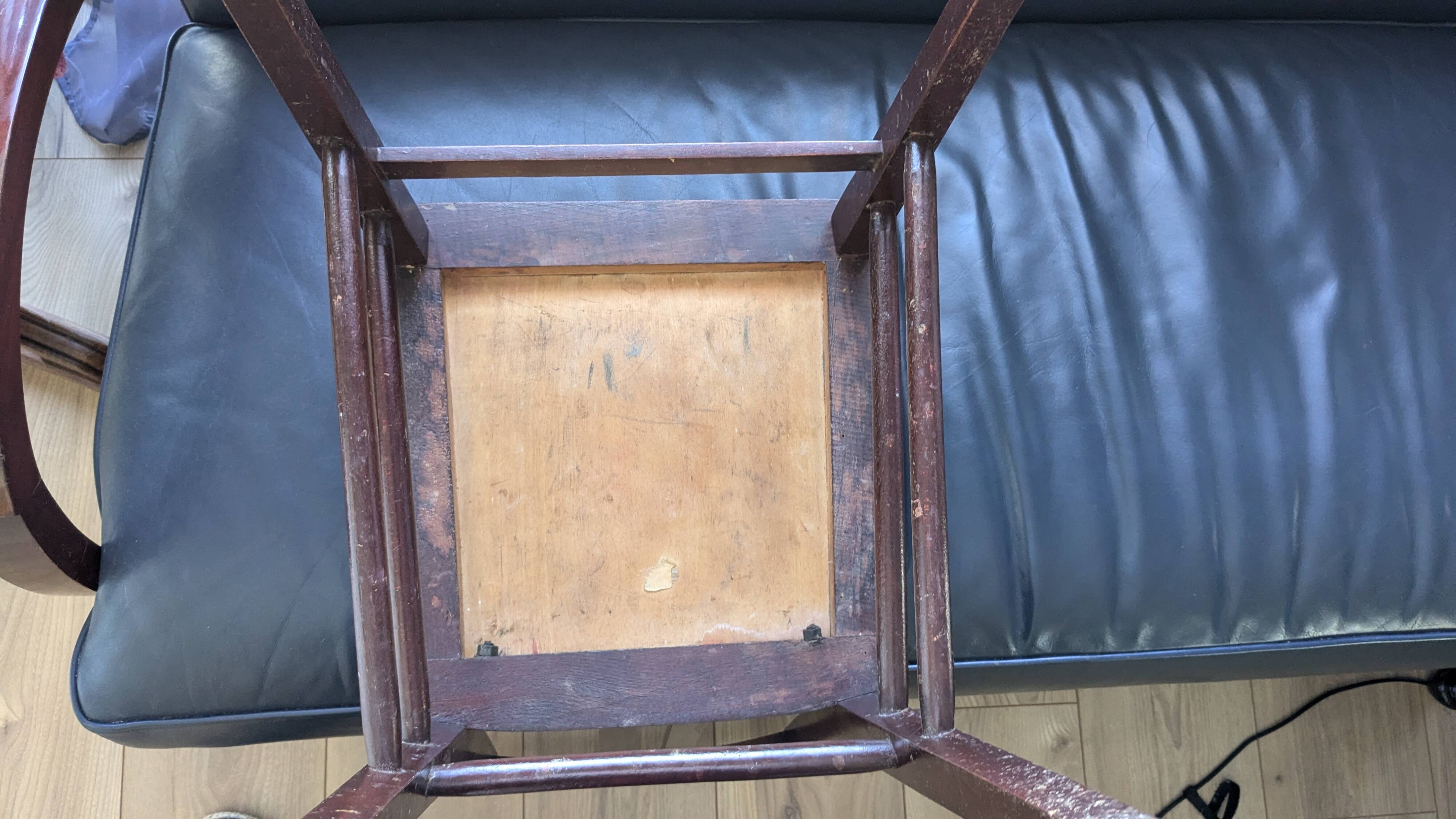 Pair of 1930s bistro chairs with patinated wood.