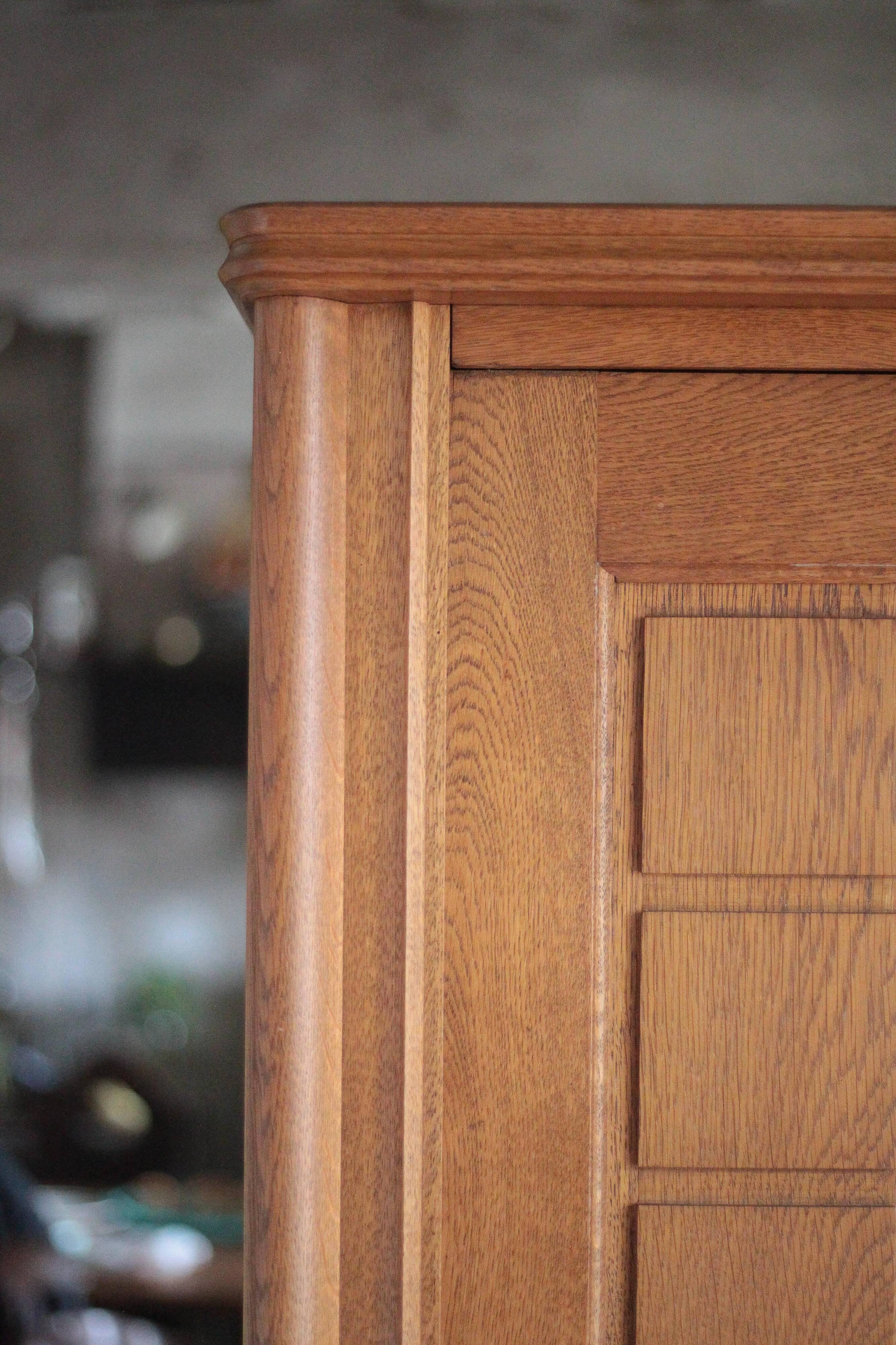 Vintage wooden wardrobe with sliding doors.