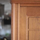 Vintage wooden wardrobe with sliding doors.