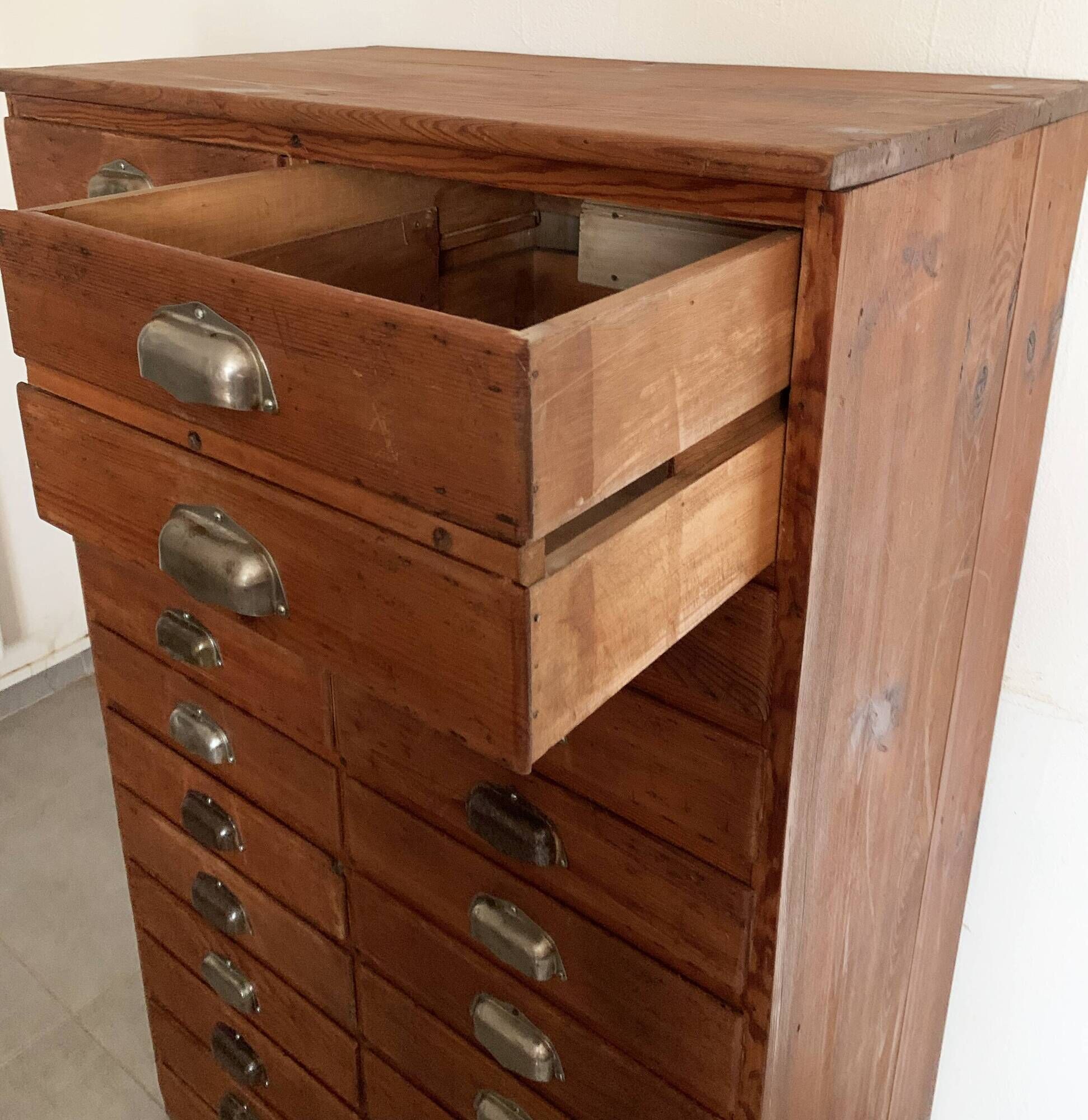 Old apothecary trade furniture in vintage wood 24 drawers.