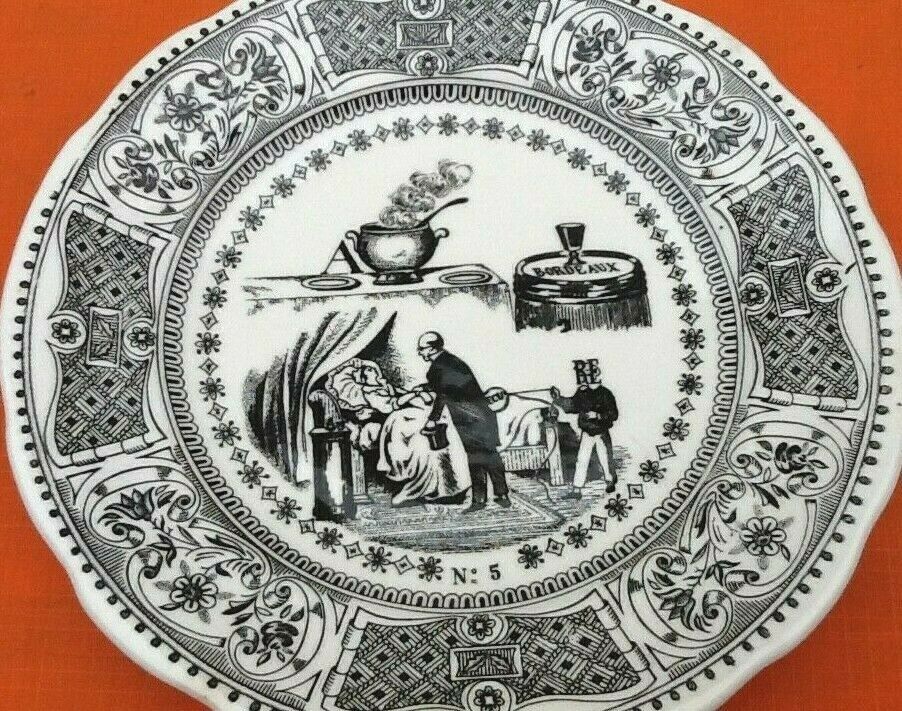 Plate " rebus " Faience of Gien After the soup a glass of wine removes a shield from the...