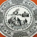 Plate " rebus " Faience of Gien After the soup a glass of wine removes a shield from the...