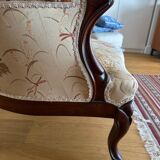 Violin-backed cabriolet armchair, in the Louis XV style.