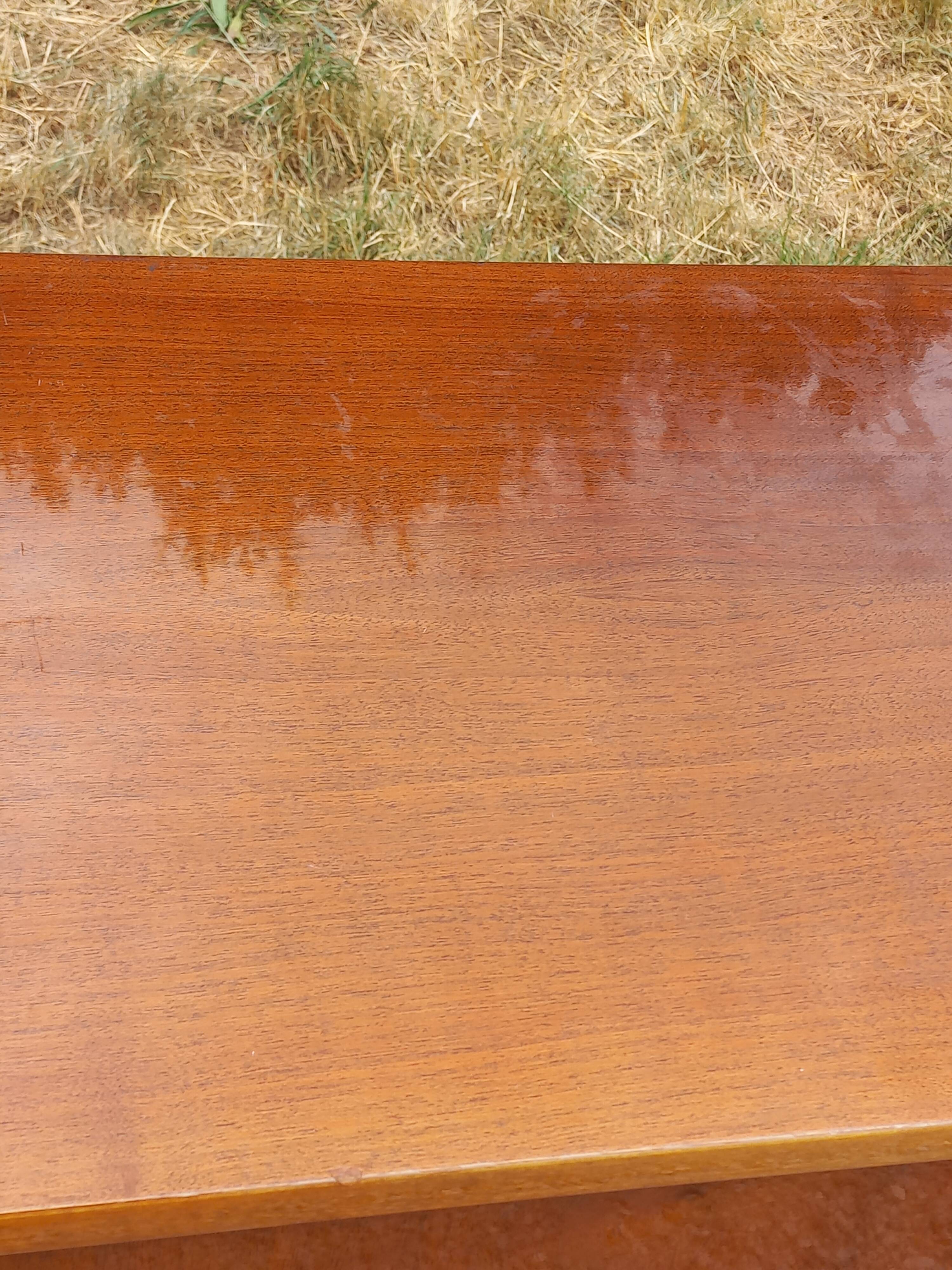 Vintage walnut varnished chest of drawers with 4 drawers from the 1960s.