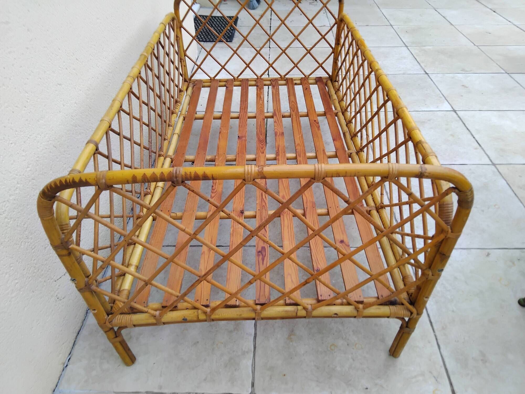Vintage rattan child or baby bed