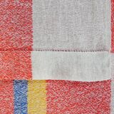 Old tablecloth and 11 towels crossed red blue
