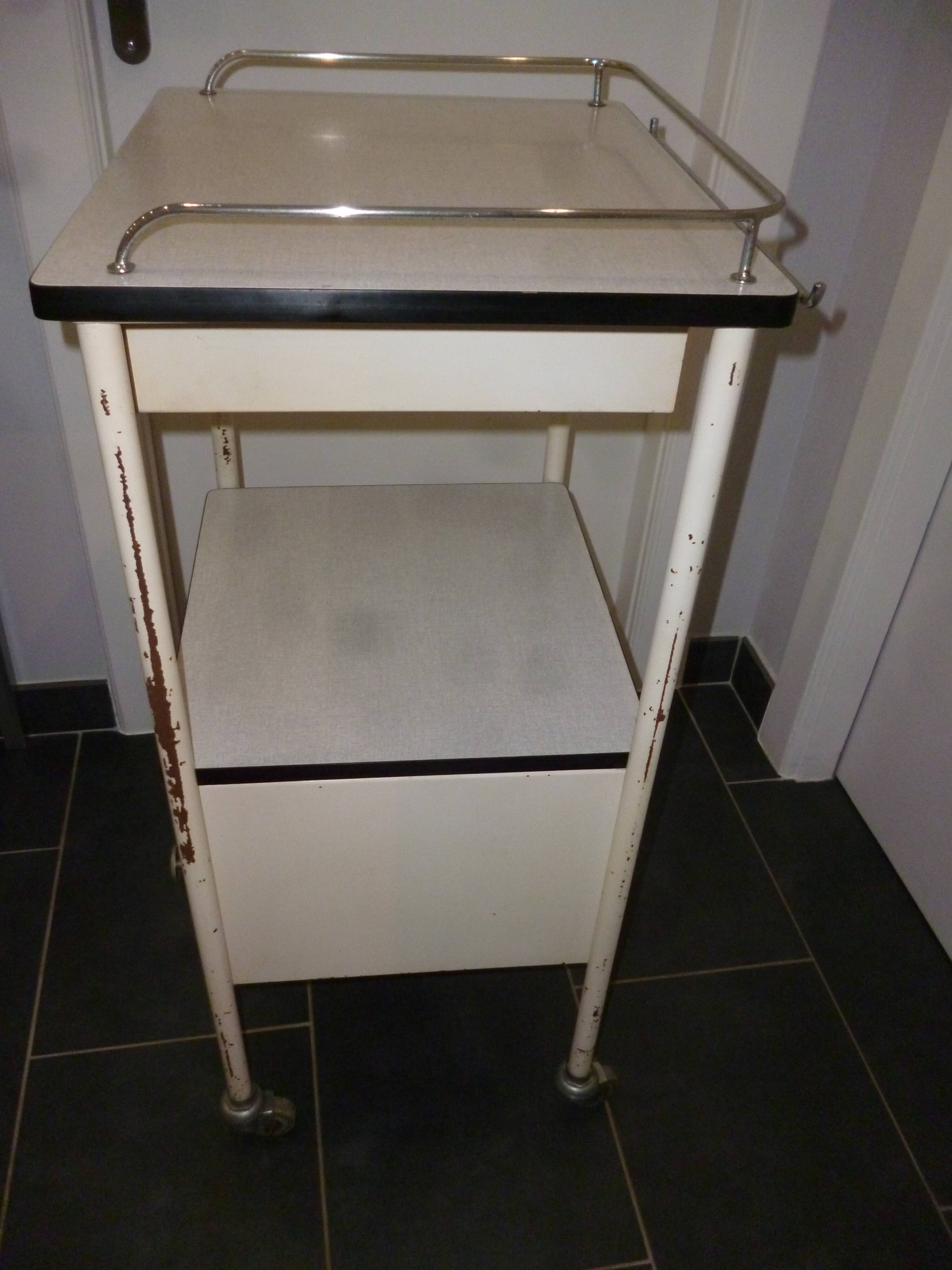 Old bedside on wheels