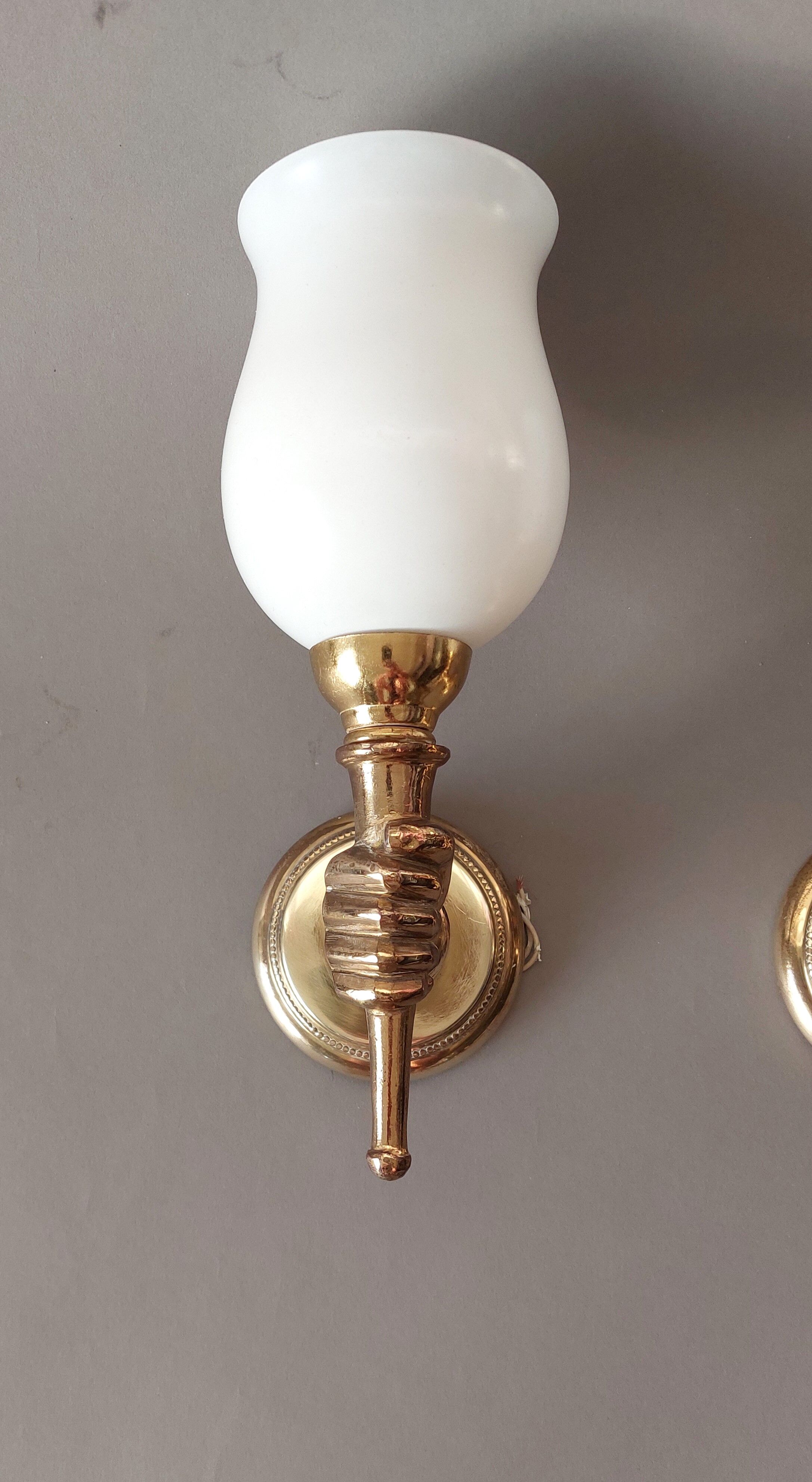 Pair of bronze and gilded brass sconces by John Devoluy 1950.