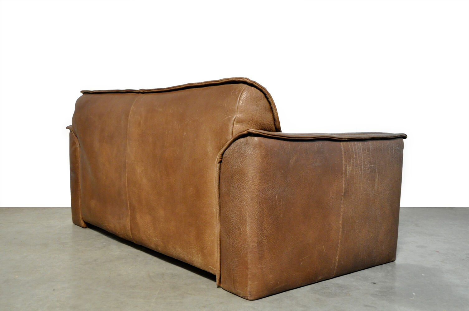 Neck leather 2-seater sofa by Hugo de Ruiter for Leolux, 1970s Netherlands