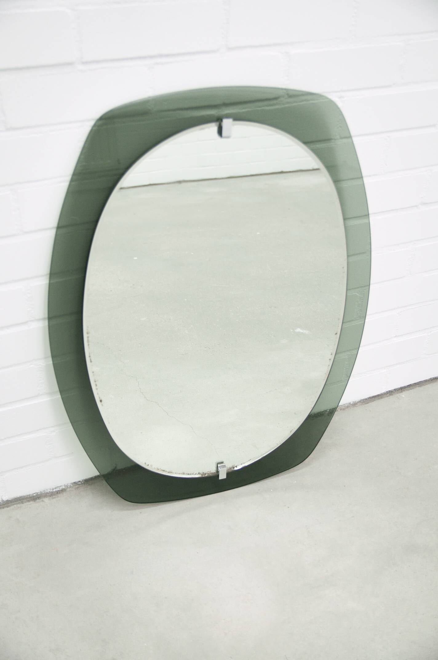 Vintage space age large smoked green glass mirror by veca