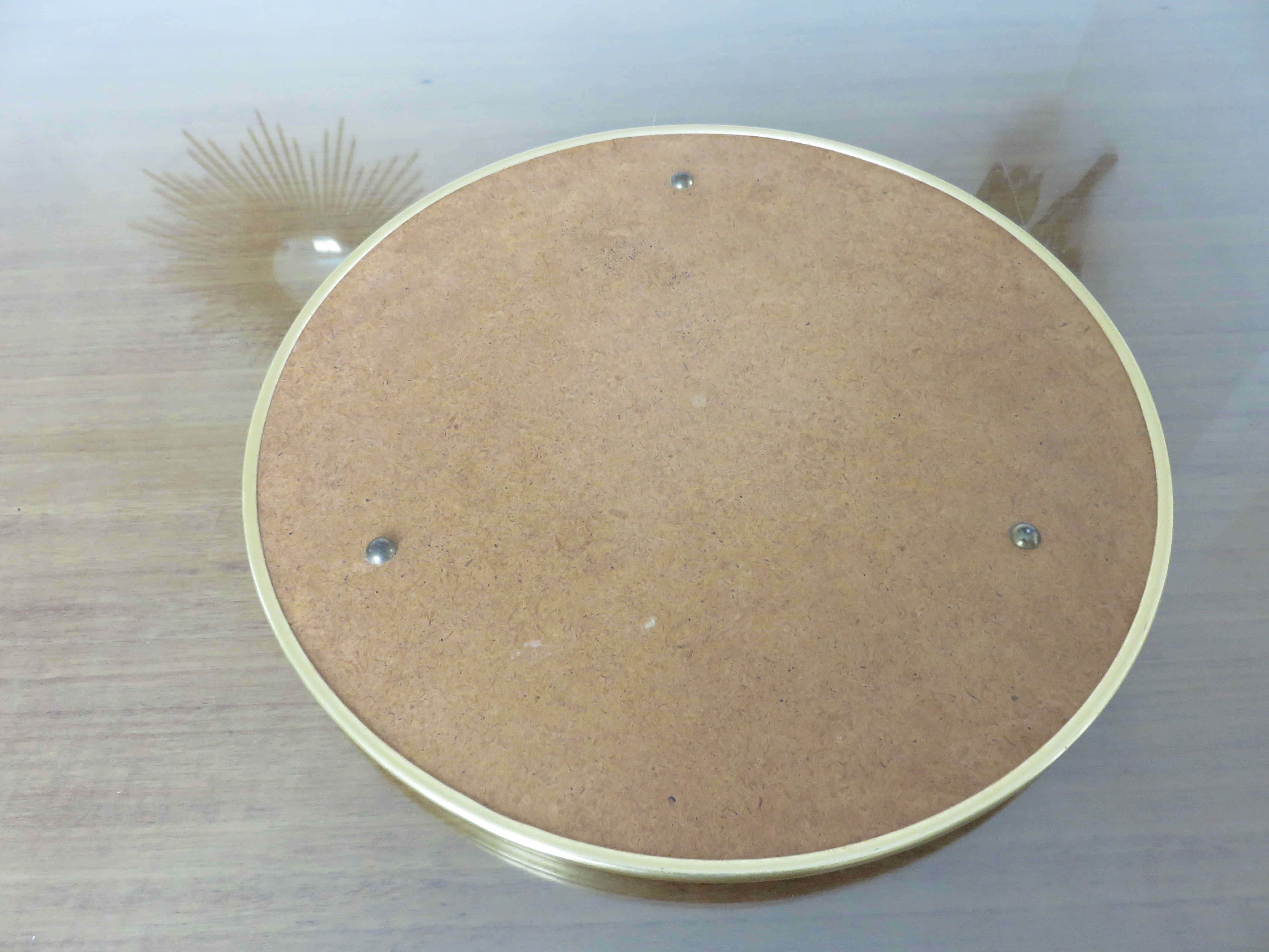 Round mirror top in gilded aluminum art deco