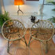 Two rattan shell chairs, 1960s