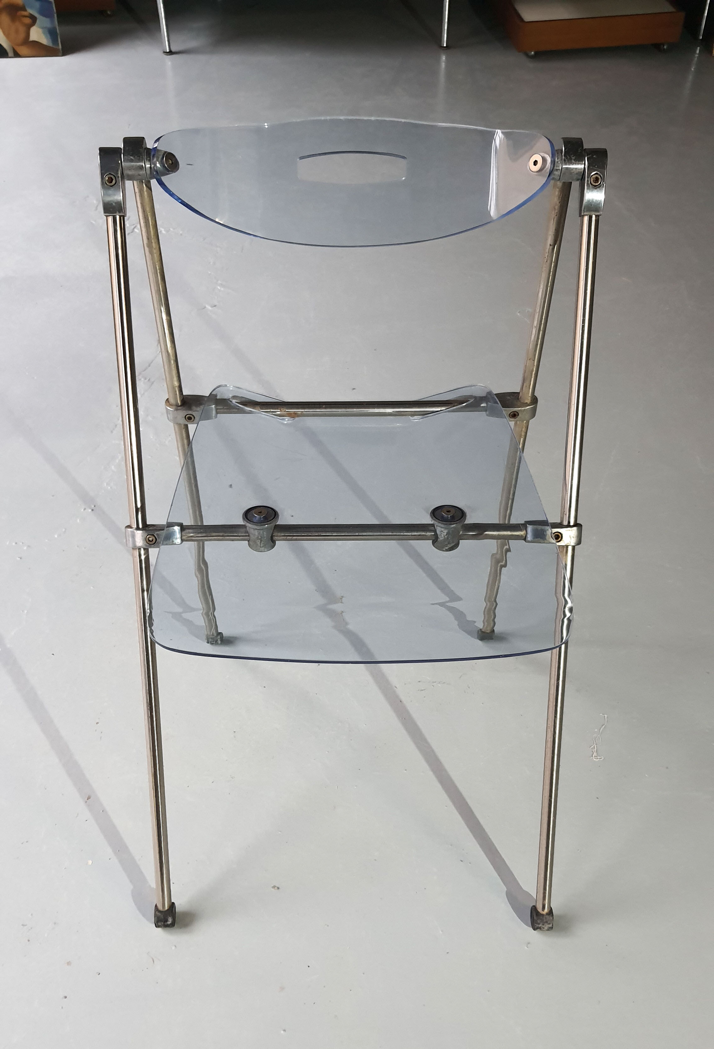 Modern folding chair in plexiglass Giancarlo Piretti - EDA Concept