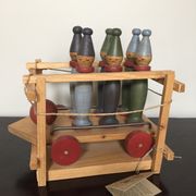 Set of Moulin Roty brand wooden bowling on roller cart, limited series.