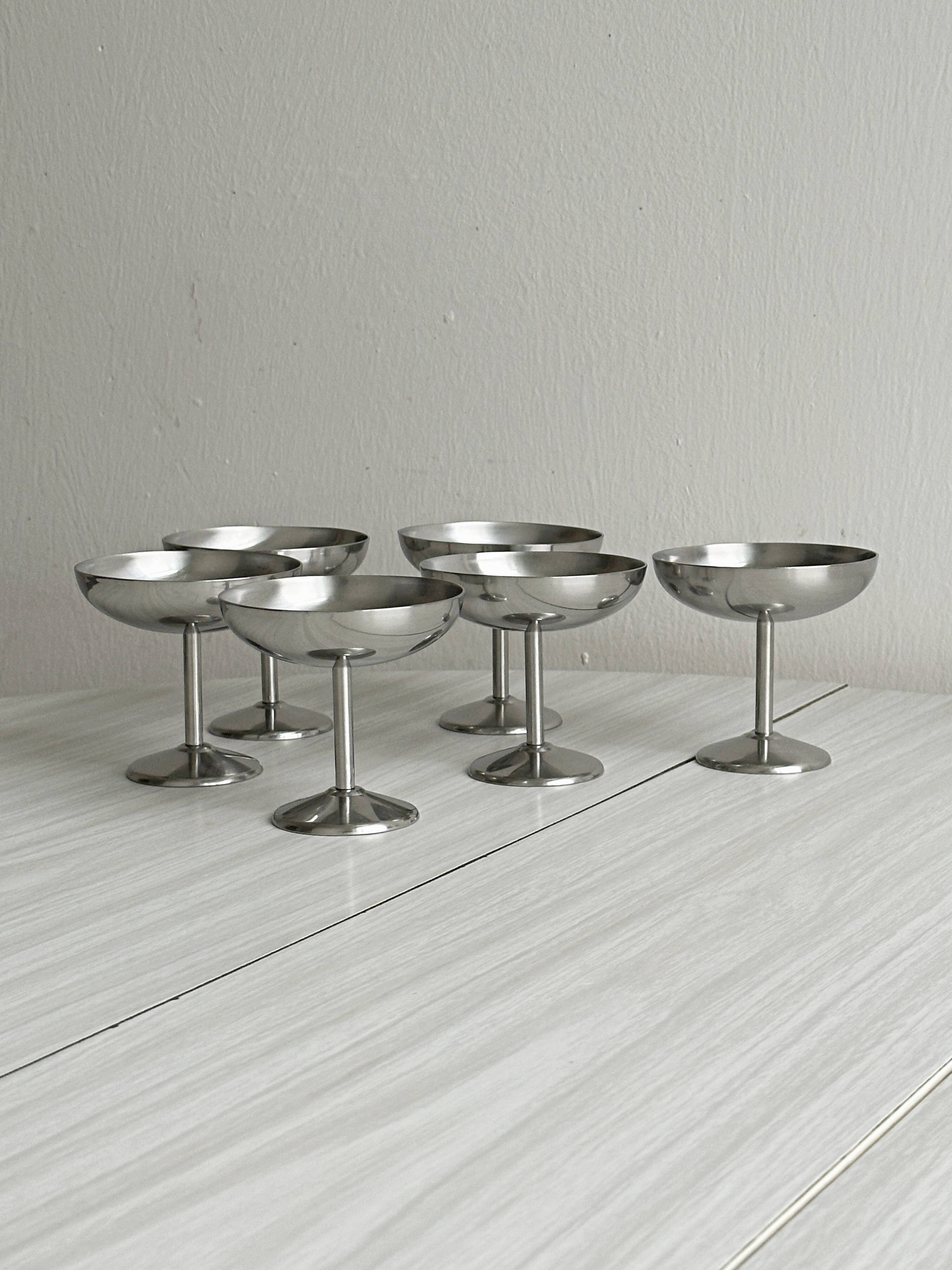 6 metal bowls in the style of Guy Degrenne