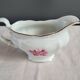 Soup tureen, gravy boat and serving dishes