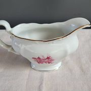 Soup tureen, sauce boat and serving dishes