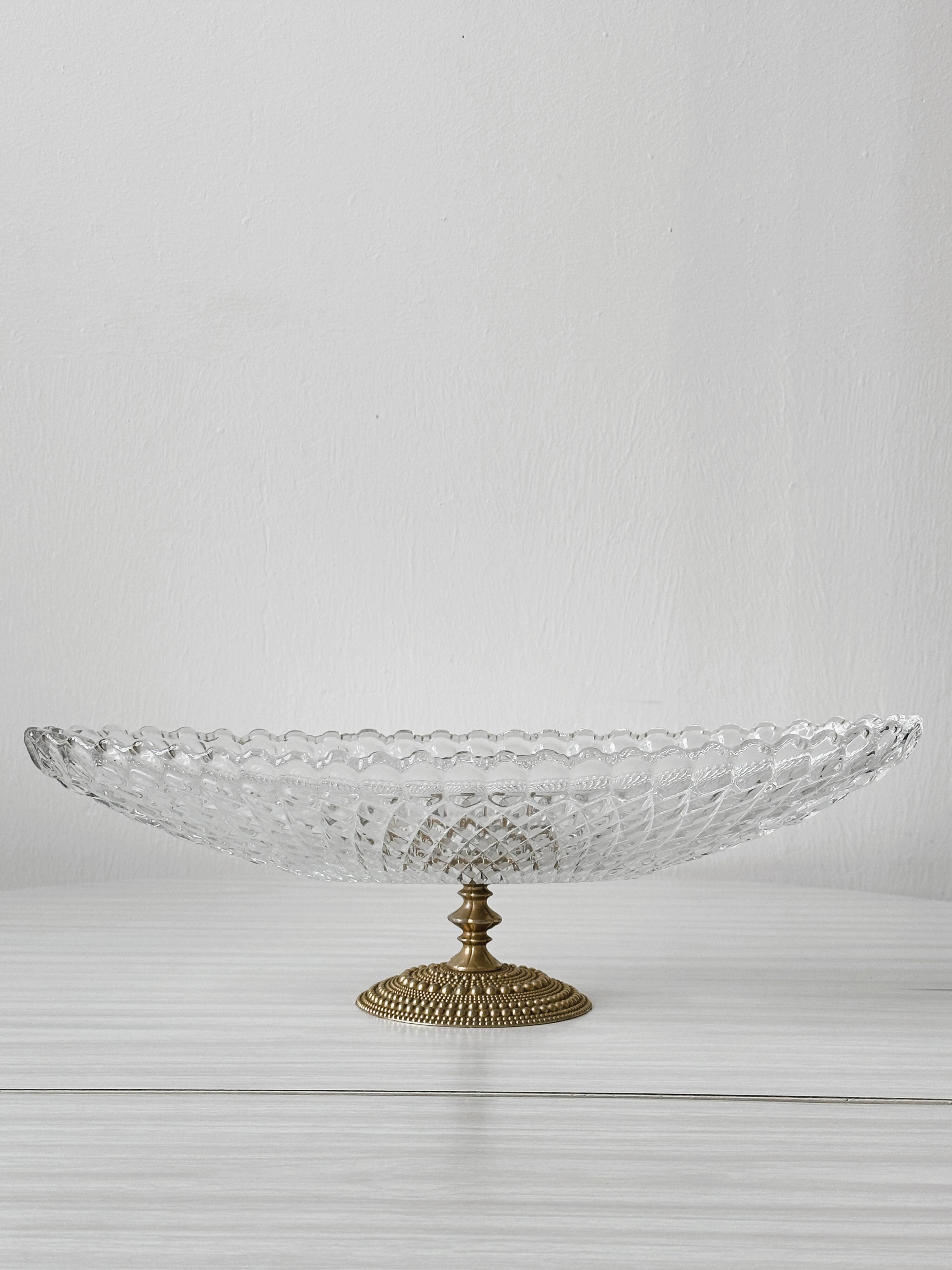 Molded glass bowl with gold metal base