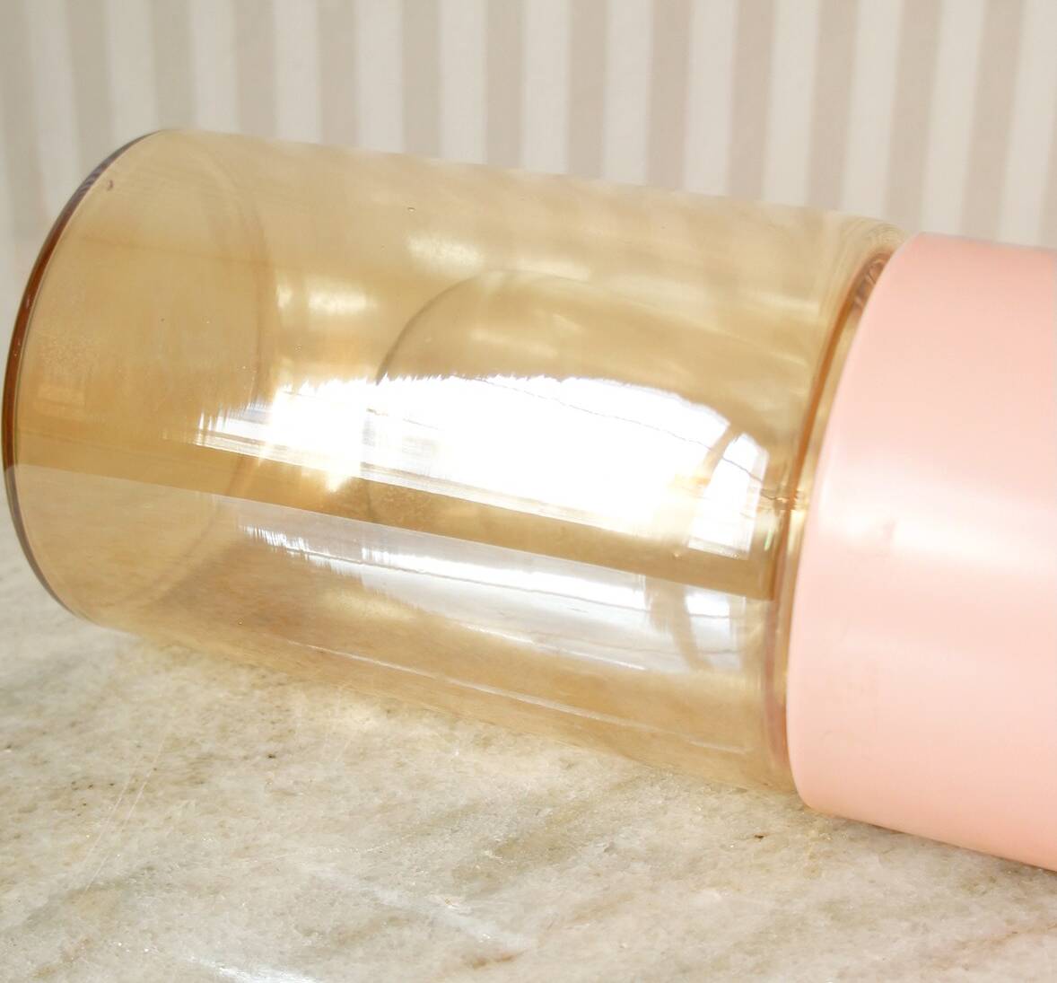 Pink metal cylinder lamp & iridescent glass