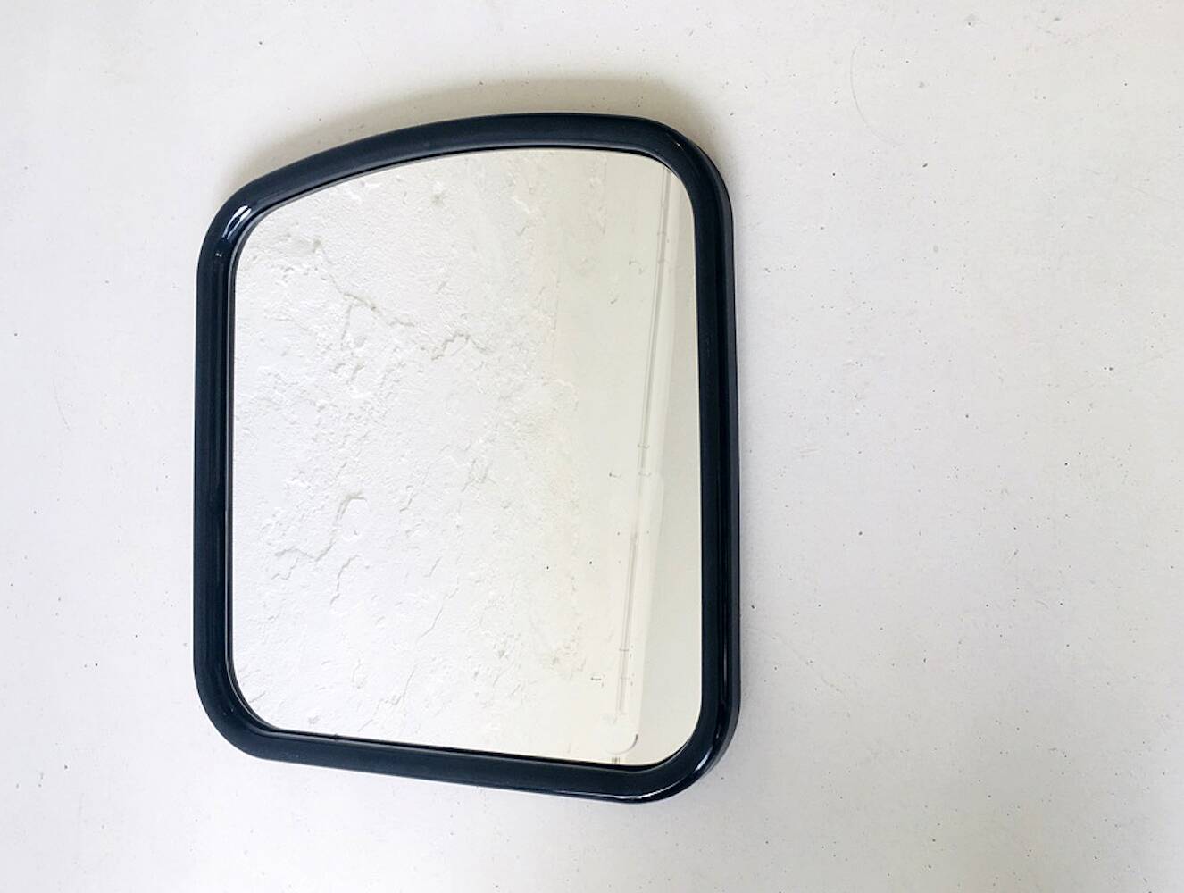 Vintage mirror with black plastic frame, 1970s