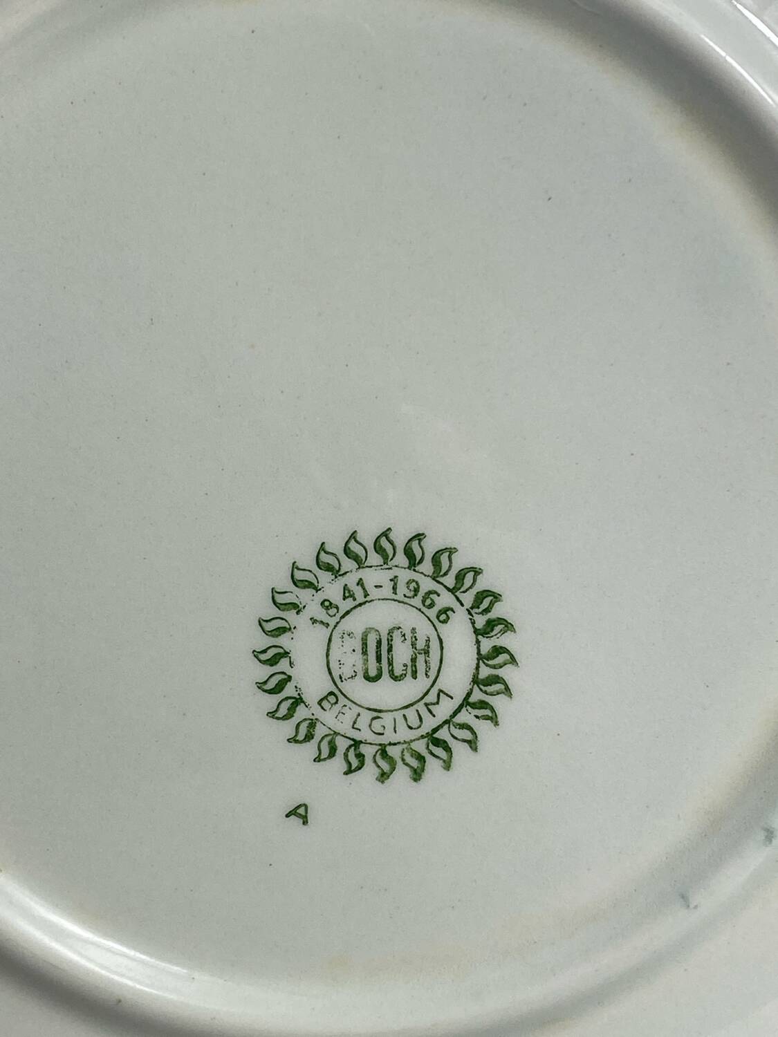 Four Boch Belgium dessert plates