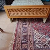 Vintage 1970s single rattan bed in blond wood