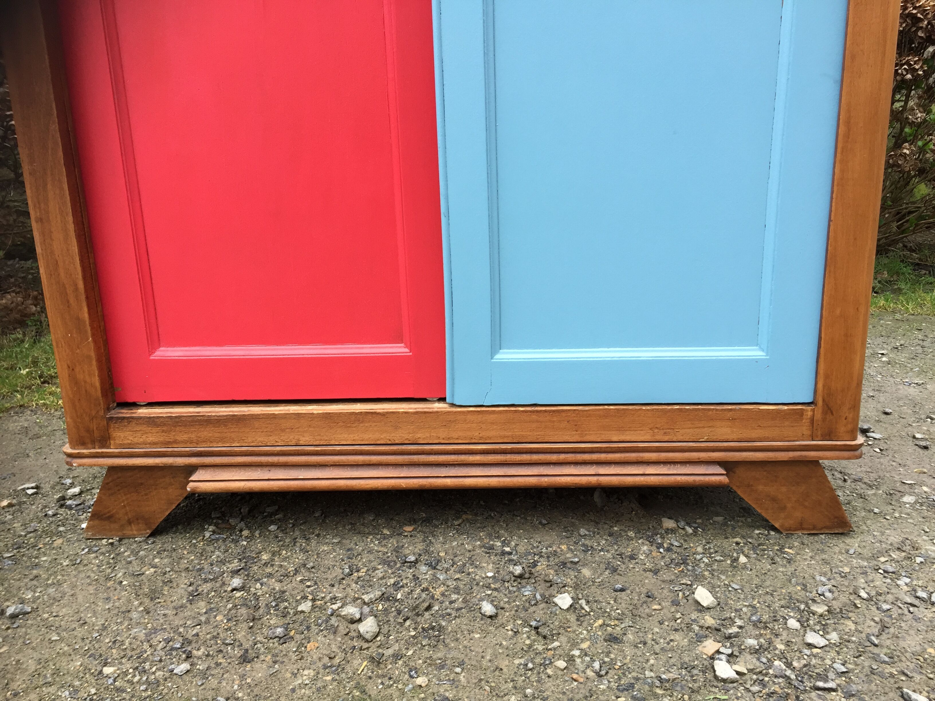 Vintage oak compass foot cabinet with 2 sliding doors painted red and blue