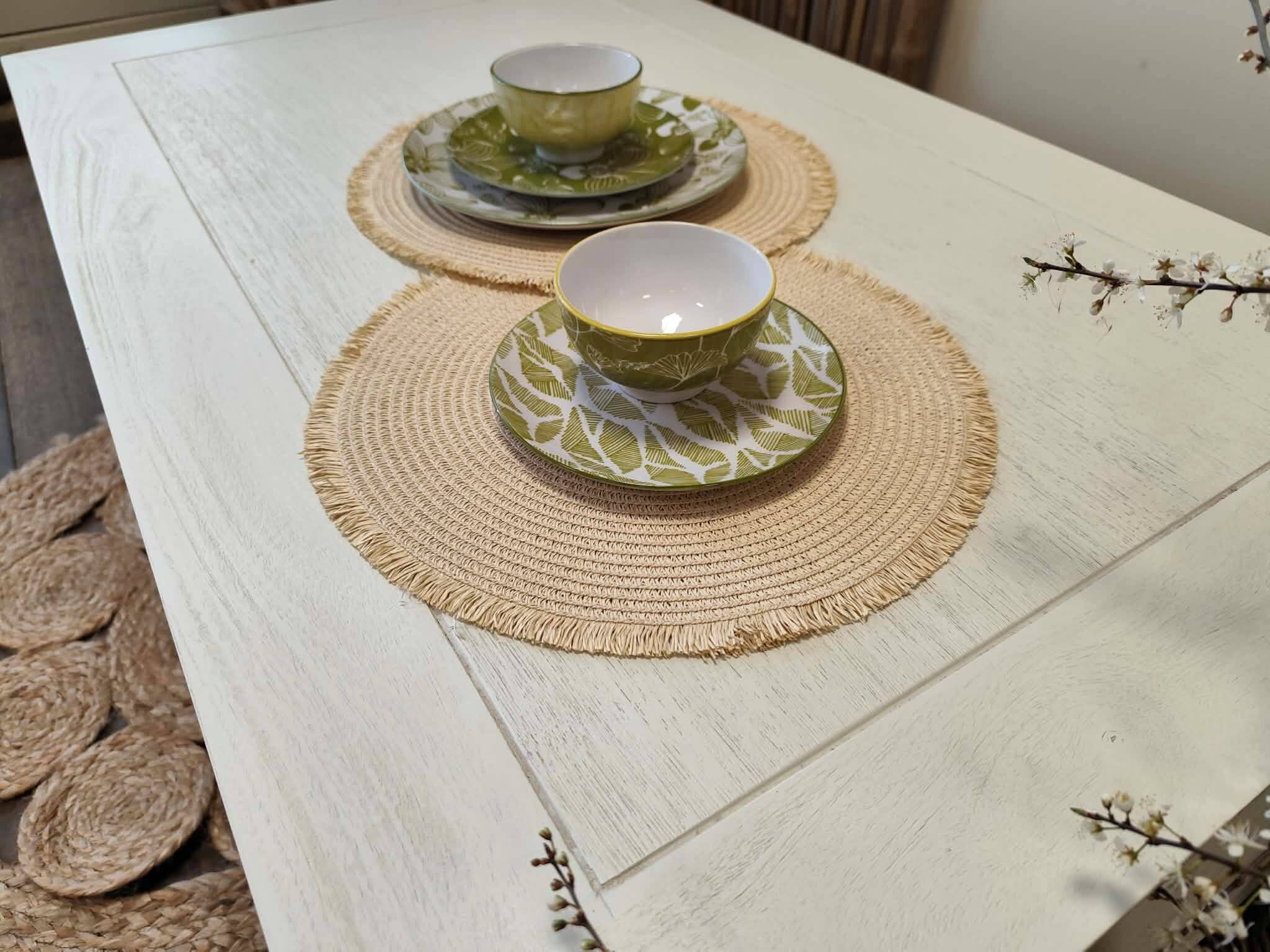 Exotic wood coffee table with its safety glass protection.