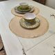 Exotic wood coffee table with its safety glass protection.