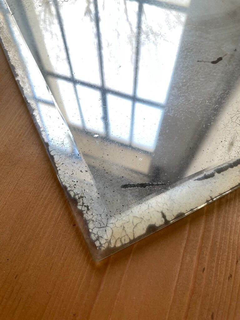 Very stung old bevelled mirror 39x60cm