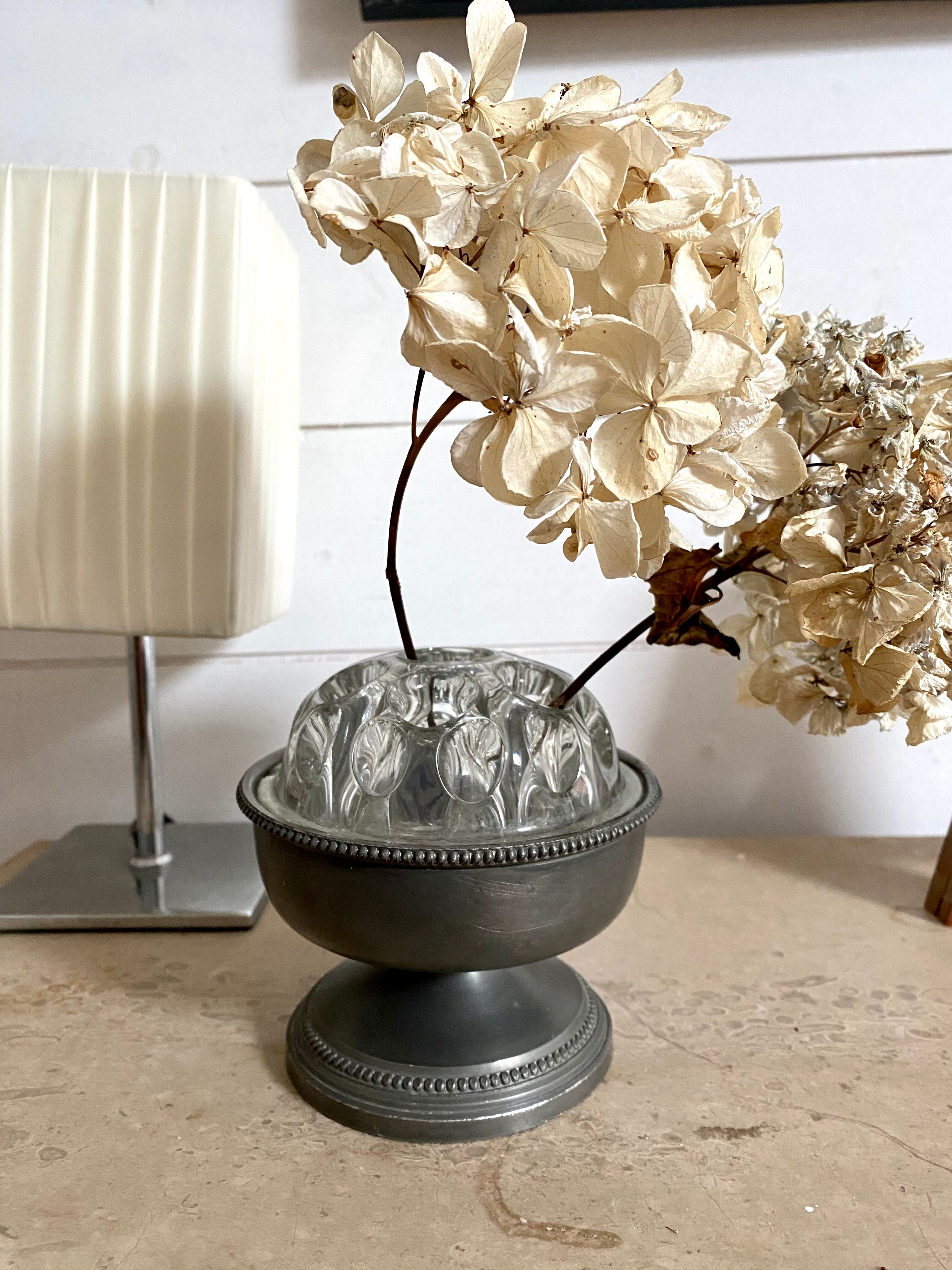 Old glass flower stick on pewter foot