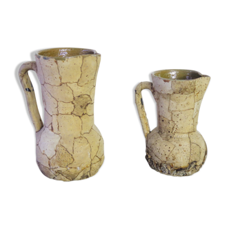 Duo of ceramic and cork pitchers