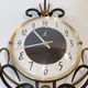 Jaz clock in black metal and golden brass, model Cabic 1967/1968